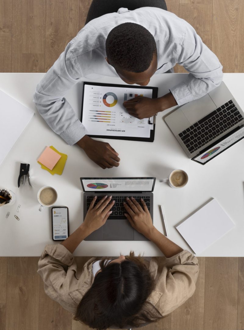 flat-lay-people-working-together-office
